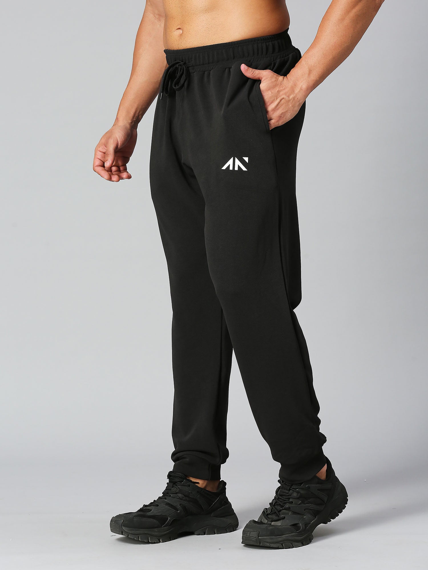 Buy ADIDAS Men Black Essentials 3 Stripes Woven Track Pants - Track Pants  for Men 2083472 | Myntra
